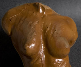 Close up of torso with shino glaze
