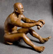 Statue of man in rowing position