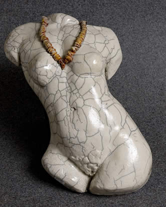 Torso sculpture with Puka Shell Lei